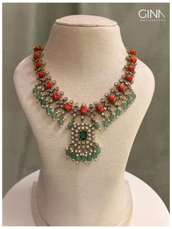 Shimmering Pavazham with Emerald Drops