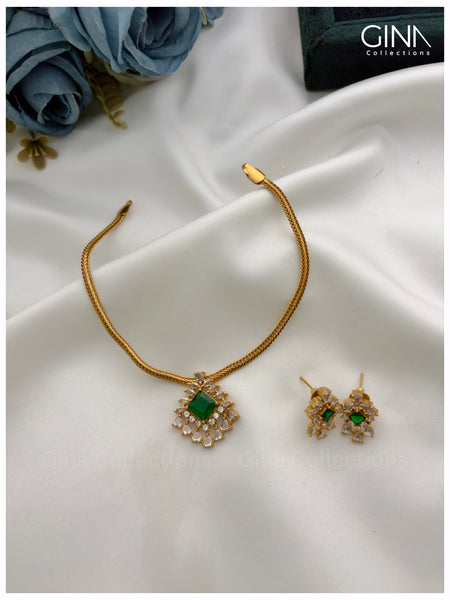 Elegant Emerald Pendant with Chain and Earrings