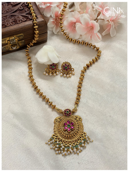Golden Beads Mala with Floral Pendant and Pearl Drops