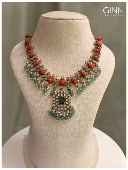 Shimmering Pavazham with Emerald Drops